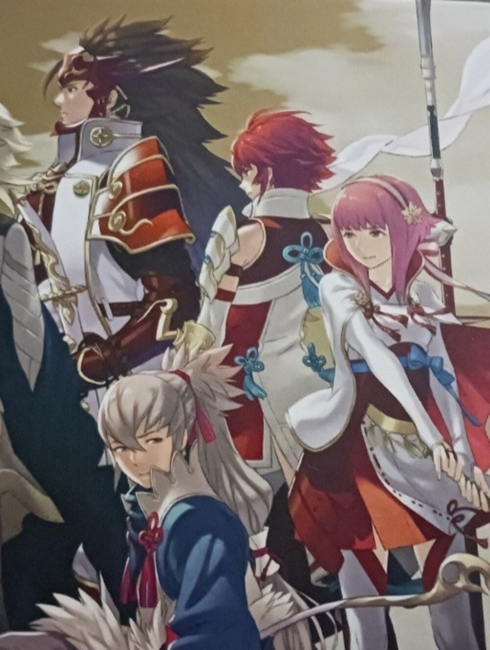 Fire Emblem Warriors artbook with anime characters in fantasy armor